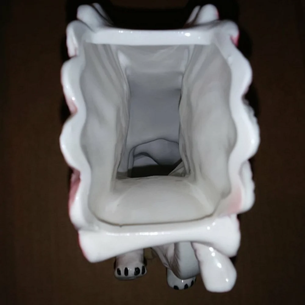 Vintage vase elephant with wings